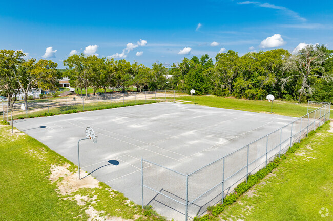Students enjoy outdoor play on the sports courts at Lecanto Middle School.