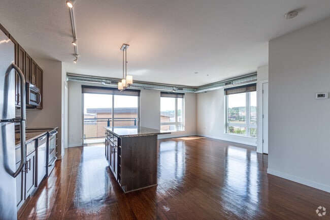 2BR, 2BA - 1,153SF - Kitchen and Living Room