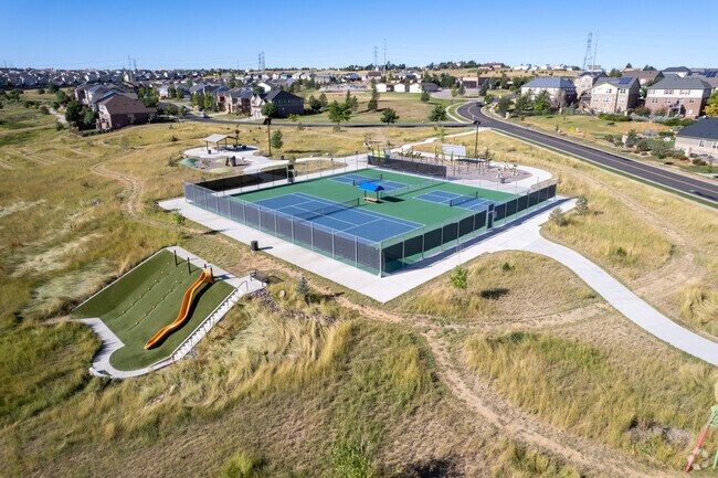 Tollgate Crossing Neighborhood Park offers tennis and pickleball courts a short walk from home.