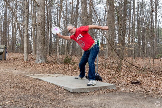 Many people love playing disc golf at Garden Grove Disc Golf Course in Forest Oaks.