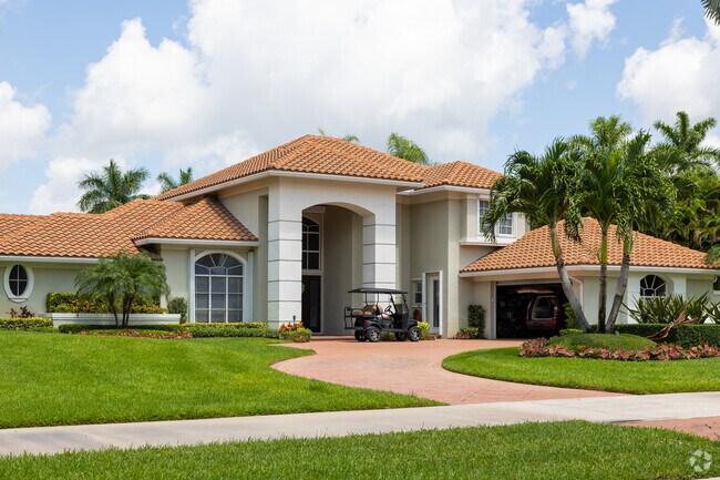 Golf carts are a popular way to navigate the Breakers West neighborhood of Royal Palm Beach, FL.
