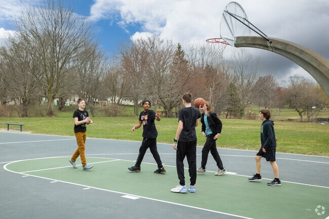 The basketball courts at Heritage Park are popular with local kids after school.