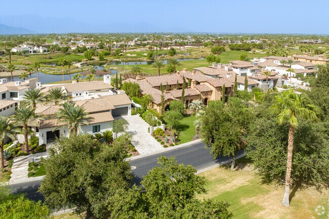 Elevated view of extravagant large homes on the Hideaway golf course.