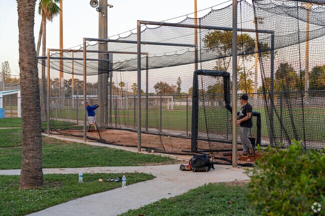 Forest Hill offers baseball fields and batting cages for residents to practice.