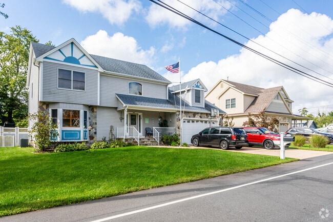 Colonial style homes are mixed in with other various styles of homes in Beachwood, NJ.