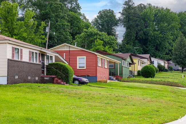 Colorful bungalows line a residential street in South End.