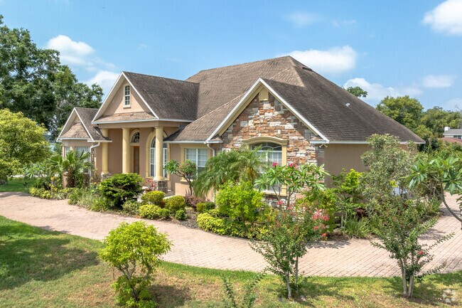 Contemporary homes with lush landscaping brighten up the neighborhood streets.