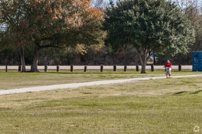 A paved walking trail is great for bikes or joggers at Mustang Park.