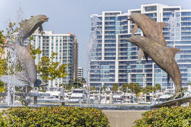 A fountain with dolphins adorns the point of Bayfront Park in Downtown Sarasota.