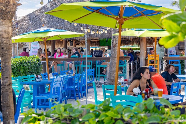 Diners relish seaside dining at Sandbar restaurant in Delray Beach.