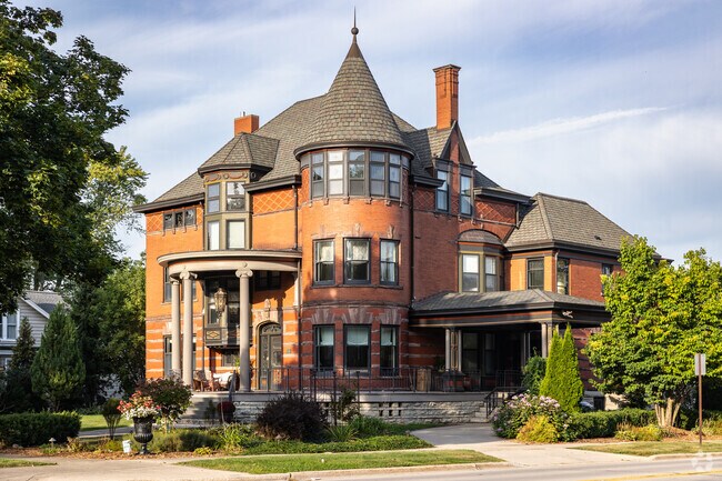 Impressive Queen Anne style homes tower above the trees of the Astor neighborhood.