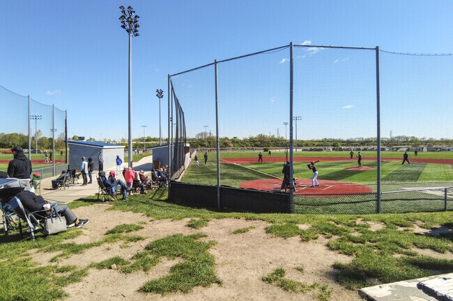 Locals gather at Action Sports Center in Old North Dayton for baseball games during the spring.