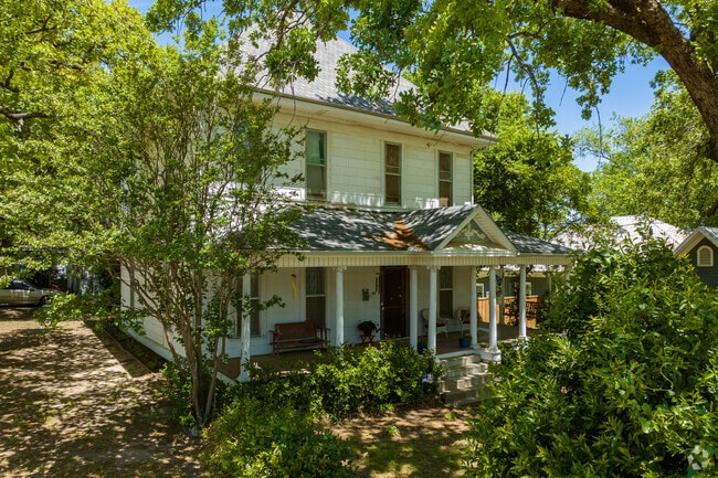 Federal style home with large covered porch in Weatherford.