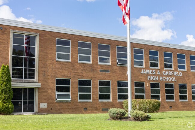 Students at James A Garfield High School root for their home team G-Men.