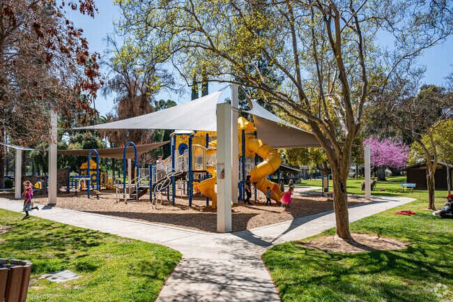 North Redlands residents enjoy watching their kids run. around the playground at Sylvan Park.