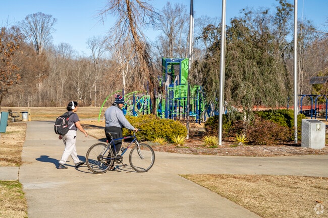 Visitors enjoying outdoor exercise at Robert L. Smith District Park.