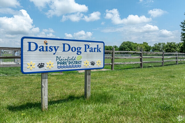 Enjoy a brisk morning walk with your pup at Daisy Dog Park.