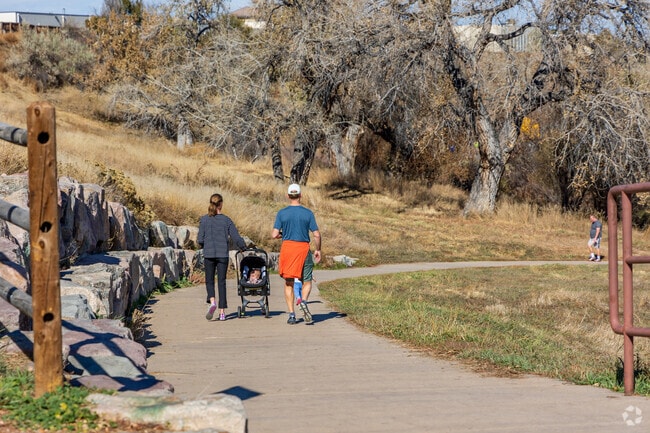 Family takes an afternoon stroll on the paved Big Dry Creek Trail.