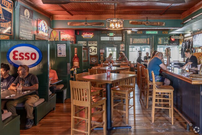 Guests at the Rogues Harbor Inn enjoy the eclectic pub downstairs.