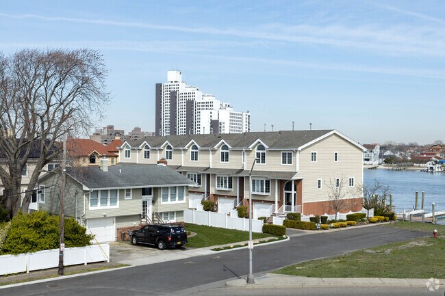 Hi Ranch homes and townhomes along Reynolds Channel have waterfront views in Atlantic Beach, New York.