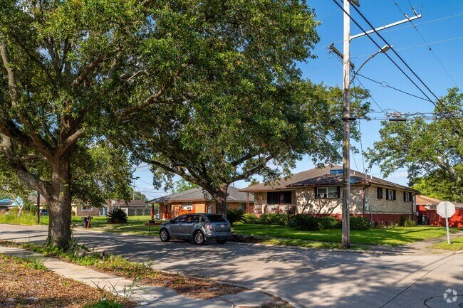 Some homes in Read Blvd West are made of brick and raised up from the ground.