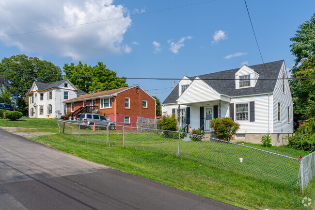 Cape cod homes and ranches sit perched along hills in Shenandoah West.