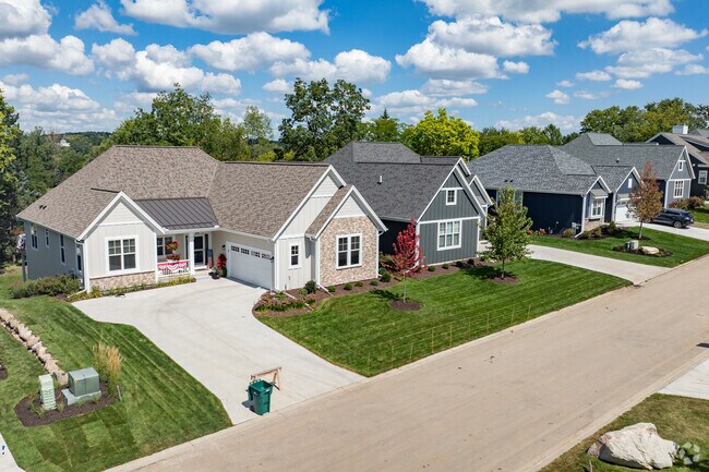 Some homes in Pewaukee Village away from the lakefront sometimes have small front porches.