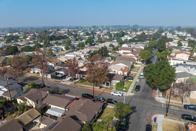 The neighborhood has many homes with their own driveways or garages.