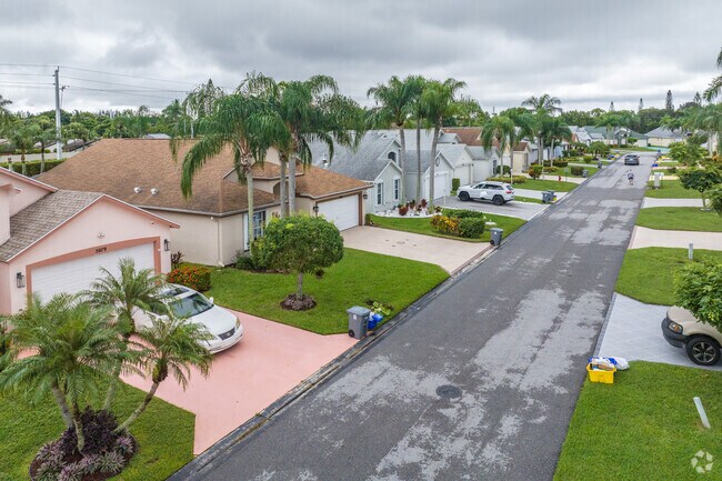 The well-maintained row homes in Cypress Lakes create a welcoming neighborhood vibe.