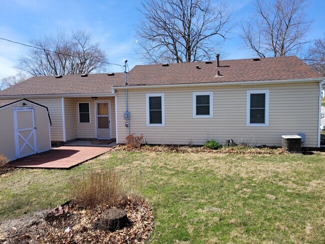 Rear of house with shed