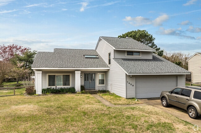 Lake Christopher showcases modern homes featuring steep angles and sloped roofs.