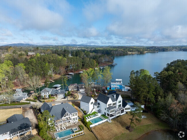 Gorgeous lake homes along Lake Lanier in Cumming, GA, showcase modern architecture, luxury living, and access to breathtaking lakefront views.