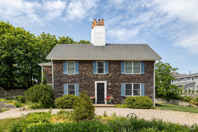 Colonial homes in Cohasset showcase historic charm and ornate architectural details.