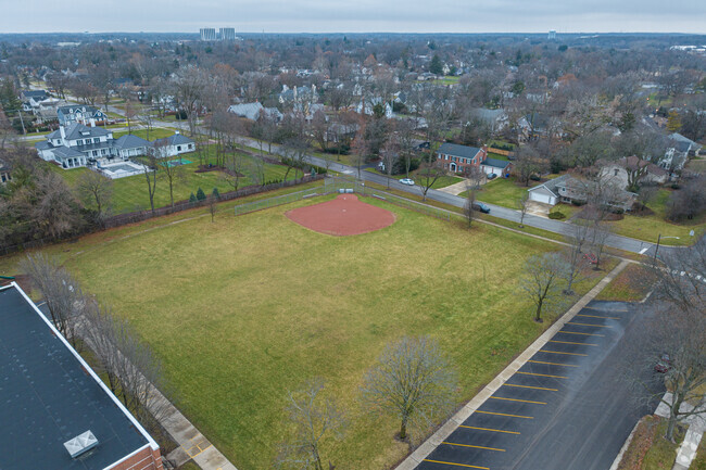 The large open softball field in Hawthorne Elementary School invites free play and imagination.