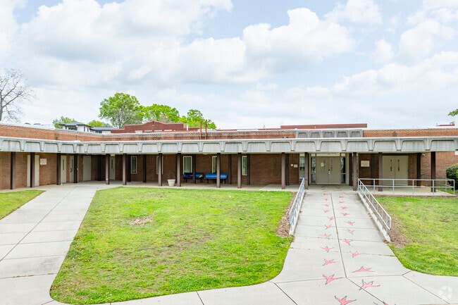 Bus rider students have a convenient entrance at their drop off at Hawthorne Academy.