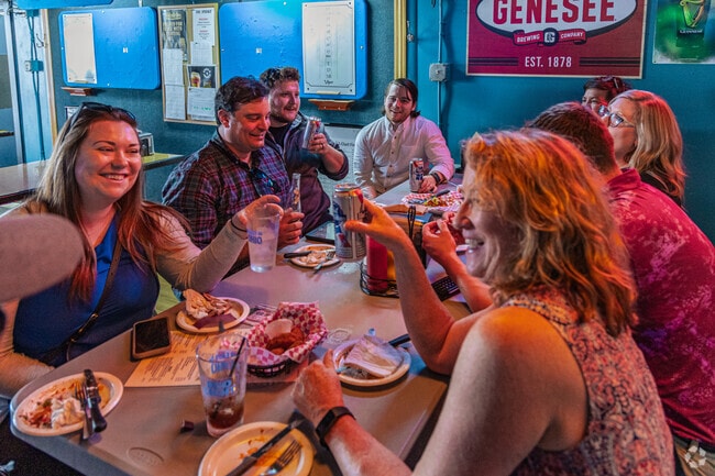 Friends gather at In Cahoots bar, in Seven Hills, to celebrate the weekend.