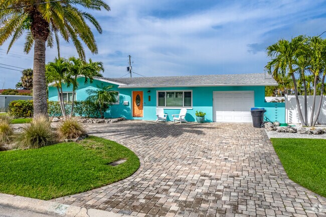 Vibrate colored ranch style homes are a very common style in Causeway Isles.
