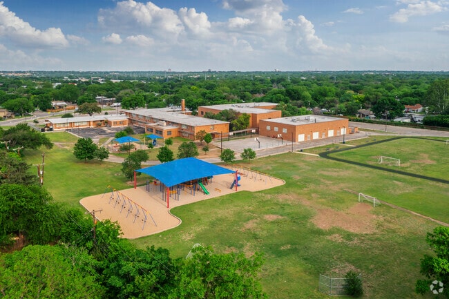 The campus of Olmos Elementary School in San Antonio has plenty of recreation for students.
