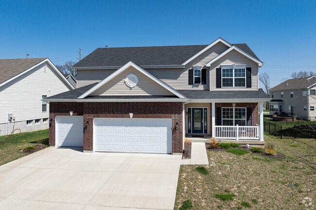 New traditional homes in Manchester blend timeless style with family-friendly design.