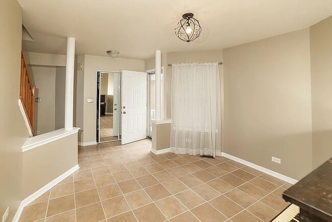 1702 Saint Ann Dr, Hanover Park, IL 60133 - photo 2