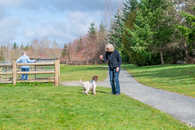 Dogs love Martha Lake Airport Park Off-Leash Dog Park in Martha Lake.