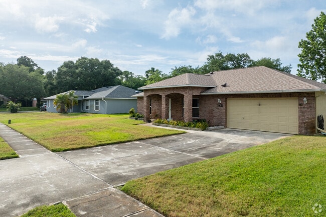 Groves homes offer lush and well-maintained front lawns.