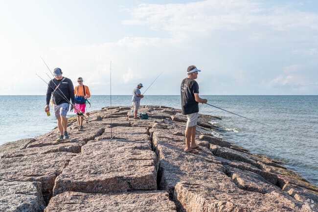 Cast a line at one of the several rock jetties that lead into the gulf in Fort Crockett.