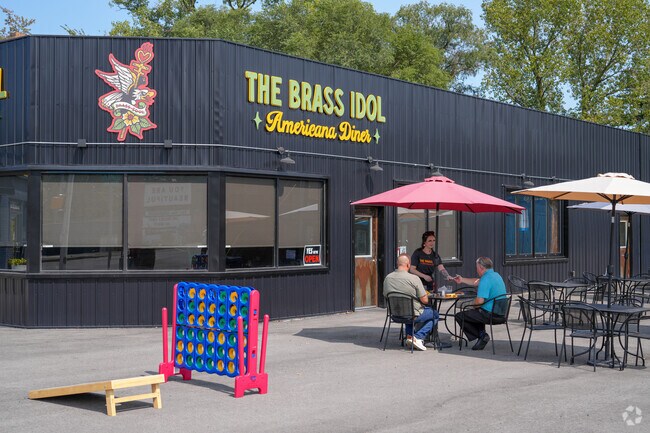 Sit outside and play backyard games at The Brass Idol.