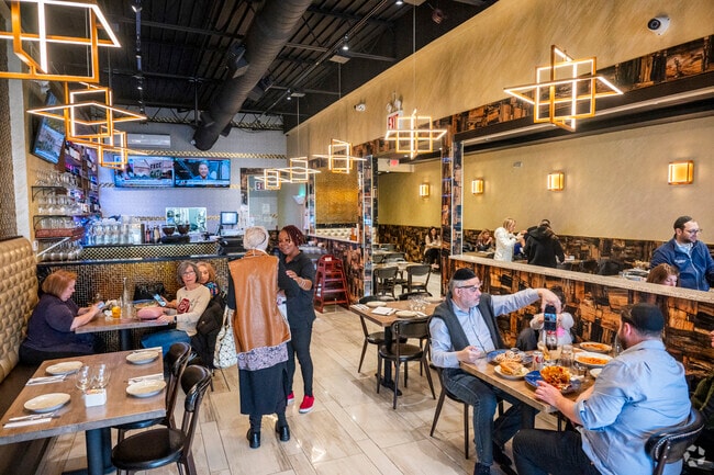 The Coffee Bar in Lawrence serves breakfast, lunch, and dinner in a warm ambiance.