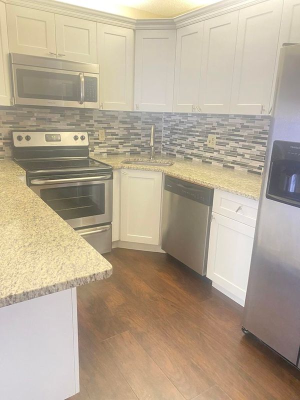 1010 Green Pine Blvd, West Palm Beach, FL 33409 - photo 1