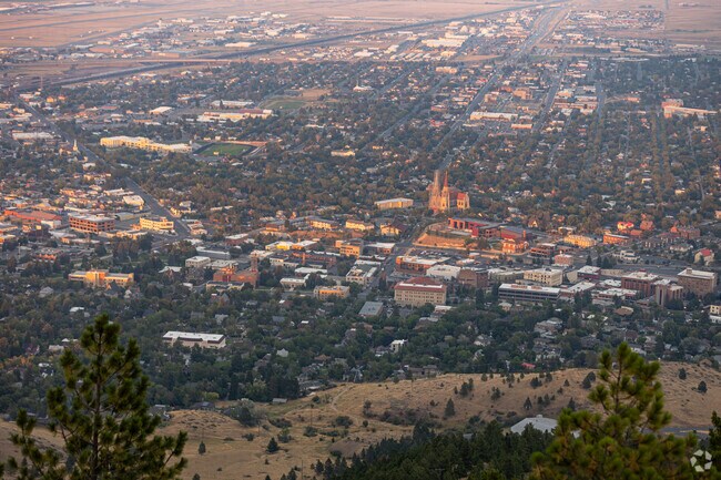 North East Helena's south west corner is connected to downtown Helena.