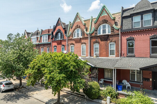 A row of Victorian-style rowhomes reminds visitors of West Powelton from long ago.