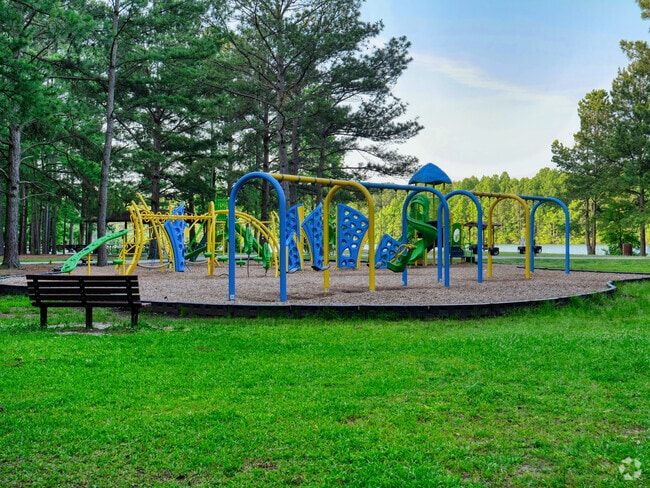 Children can enjoy the large colorful playground at Oak Grove Lake Park.