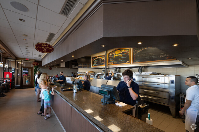 Carnival Pizzeria is a hopping restaurant that offers sit town dining as well as take away.